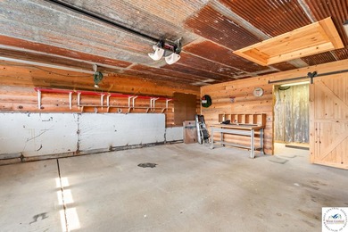 Experience the rustic charm of this log-sided home with stunning - photo 26