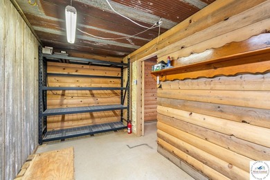 Experience the rustic charm of this log-sided home with stunning - photo 27