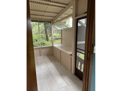 Enjoy tropical paradise in this comfortable 4 bedroom, 2 bath - photo 4