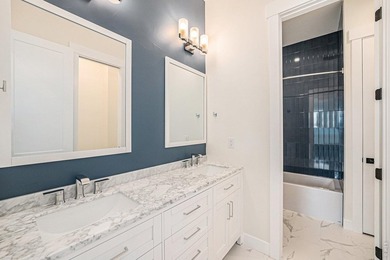 Welcome to this exquisite custom-built home nestled in the heart - photo 16