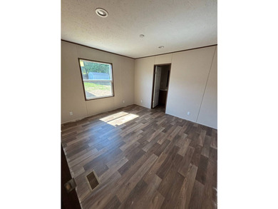 This BRAND NEW 3-bedroom 2-bathroom mobile home offers comfort - photo 5