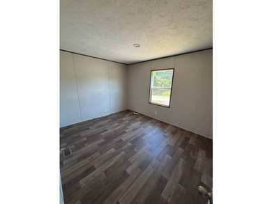 This BRAND NEW 3-bedroom 2-bathroom mobile home offers comfort - photo 7