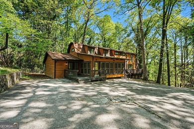 A private lake retreat priced below appraised value. Discover - photo 2