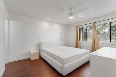 Wake up to tranquil lake and golf course views in this - photo 12