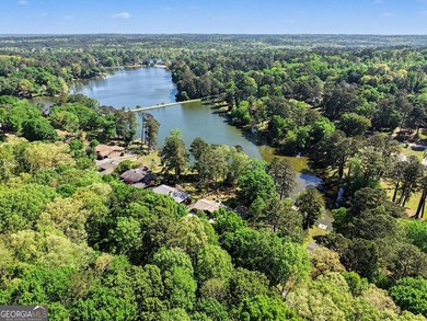A private lake retreat priced below appraised value. Discover - photo 3