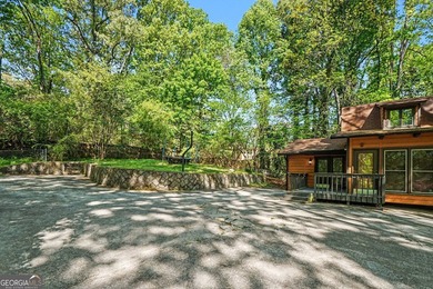 A private lake retreat priced below appraised value. Discover - photo 7