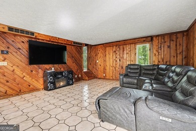 A private lake retreat priced below appraised value. Discover - photo 9