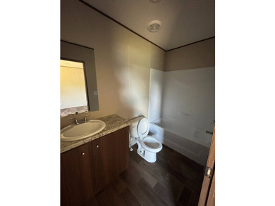 This BRAND NEW 2-bedroom 2-bathroom mobile home offers comfort - photo 6