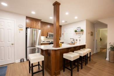 Welcome to Backwaters Condos-lake living at its finest on - photo 4