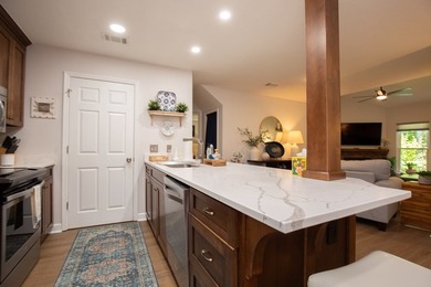 Welcome to Backwaters Condos-lake living at its finest on - photo 7