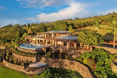 Set on just over two acres within Ooma Plantation, this striking - photo 1