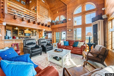 Gull Cottage presents a rare opportunity to own a custom-built