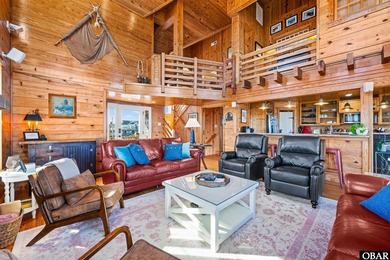 Gull Cottage presents a rare opportunity to own a custom-built