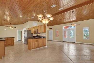 Welcome to Tequesta Country Club, where golf course living meets - photo 13