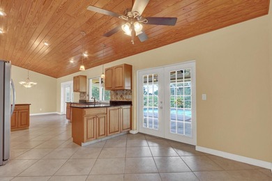 Welcome to Tequesta Country Club, where golf course living meets - photo 17
