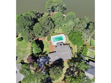 Welcome to lakefront living at 7043 Winthrop Court, a rare - photo 2