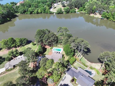Welcome to lakefront living at 7043 Winthrop Court, a rare - photo 3