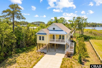 Welcome to your dream Outer Banks soundfront home; a serene