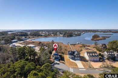 Welcome to your dream Outer Banks soundfront home; a serene