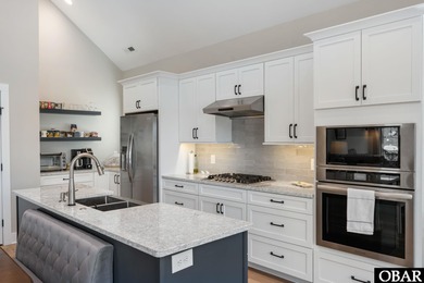 Welcome to your dream Outer Banks soundfront home; a serene