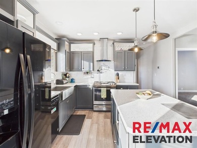 Set on 35.5 acres, this property features two modern homes, a