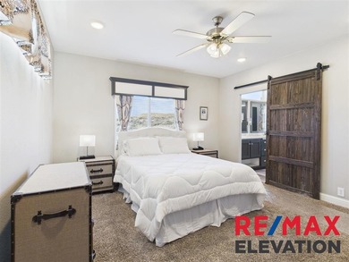 Set on 35.5 acres, this property features two modern homes, a