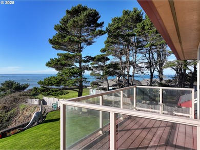 Perched above the sandy shoreline on the coveted Harbor Bench