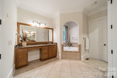 Located in the exclusive gated community of Chatelaine, this - photo 11