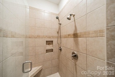 Located in the exclusive gated community of Chatelaine, this - photo 13