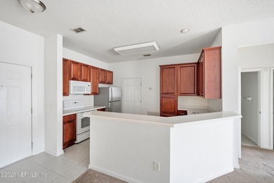 Welcome to easy, low-maintenance living in the highly desirable