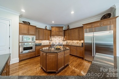 Located in the exclusive gated community of Chatelaine, this - photo 21