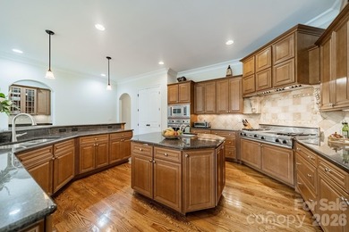 Located in the exclusive gated community of Chatelaine, this - photo 23