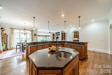 Located in the exclusive gated community of Chatelaine, this - photo 25