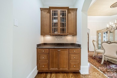 Located in the exclusive gated community of Chatelaine, this - photo 26