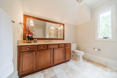 Located in the exclusive gated community of Chatelaine, this - photo 34