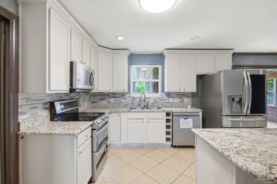 Don't miss this spacious 4 bedroom, 2 bathroom home conveniently - photo 11