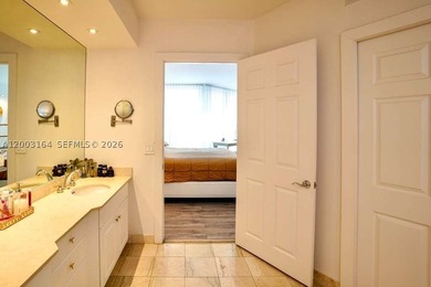 Located in the prestigious Hidden Bay Condo, this stunning - photo 12