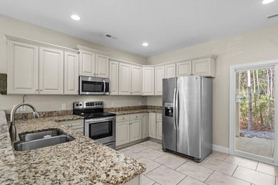 An exceptionally maintained 3-bedroom, 2.5 bath, end unit - photo 15