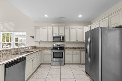 An exceptionally maintained 3-bedroom, 2.5 bath, end unit - photo 17