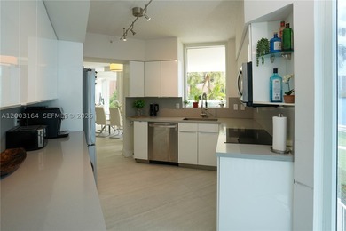 Located in the prestigious Hidden Bay Condo, this stunning - photo 18