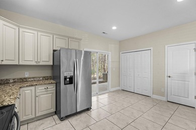 An exceptionally maintained 3-bedroom, 2.5 bath, end unit - photo 20
