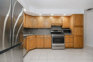 Welcome to 323 Main Street, a brick ranch set in the heart of - photo 12