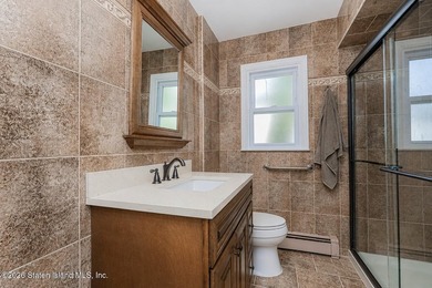 Welcome to 323 Main Street, a brick ranch set in the heart of - photo 13