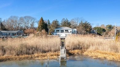 Sited on Sag Harbor Cove in the sought-after Bay Point community - photo 1