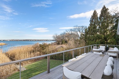 Sited on Sag Harbor Cove in the sought-after Bay Point community - photo 2