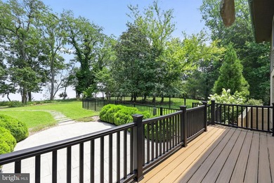 Nestled along the shores of the Patuxent River is this very - photo 2