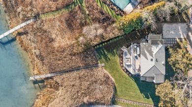 Sited on Sag Harbor Cove in the sought-after Bay Point community - photo 3