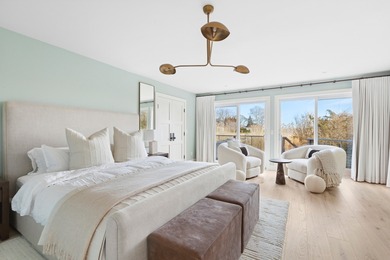 Sited on Sag Harbor Cove in the sought-after Bay Point community - photo 10
