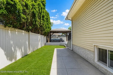 Welcome to 323 Main Street, a brick ranch set in the heart of - photo 33