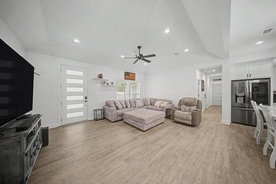 Beautifully designed 3-bedroom, 2.5-bath home backing up to the - photo 11